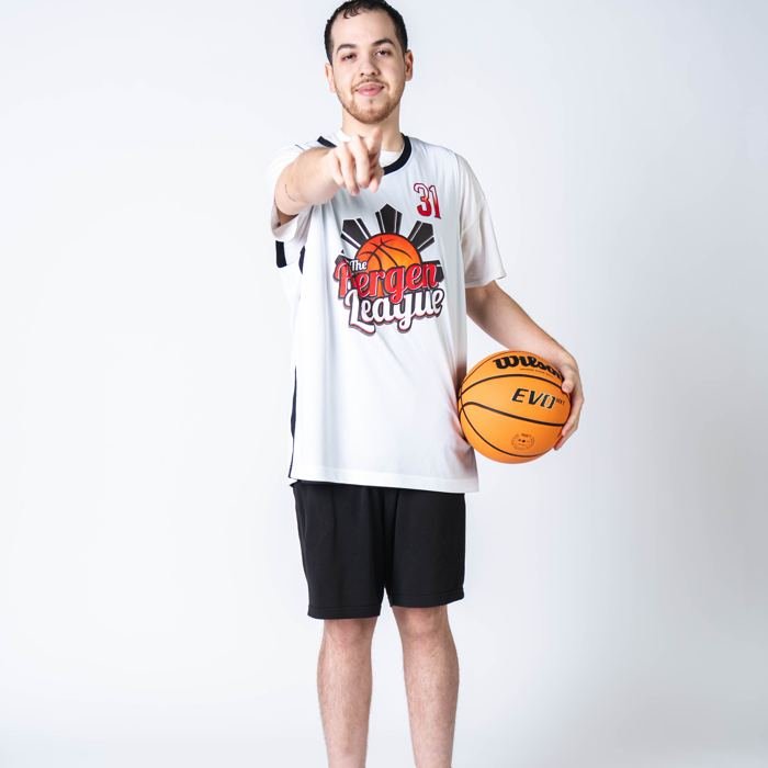 Media-day portrait, pointing at the camera